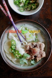 SLOW-COOKED OXTAILS WITH RICE NOODLES
