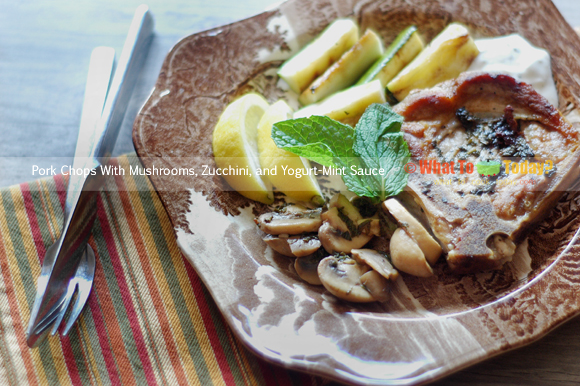 PORK CHOPS WITH MUSHROOMS, ZUCCHINI, AND YOGURT-MINT SAUCE