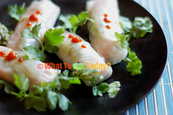 STEAMED RICE PAPER-WRAPPED SALMON WITH MACADAMIA NUTS PESTO