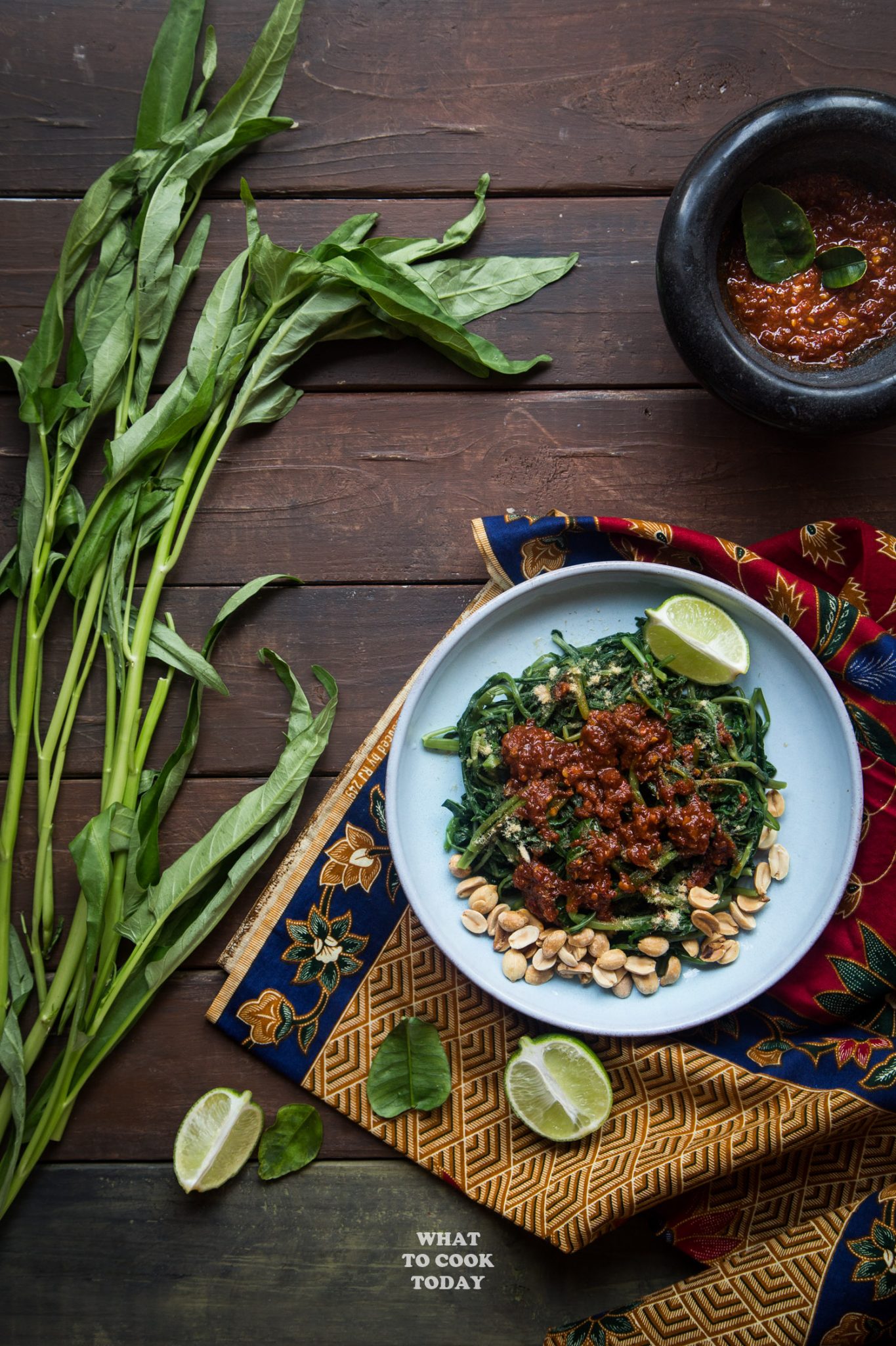 Lombok plecing kangkung (Water spinach with sambal)