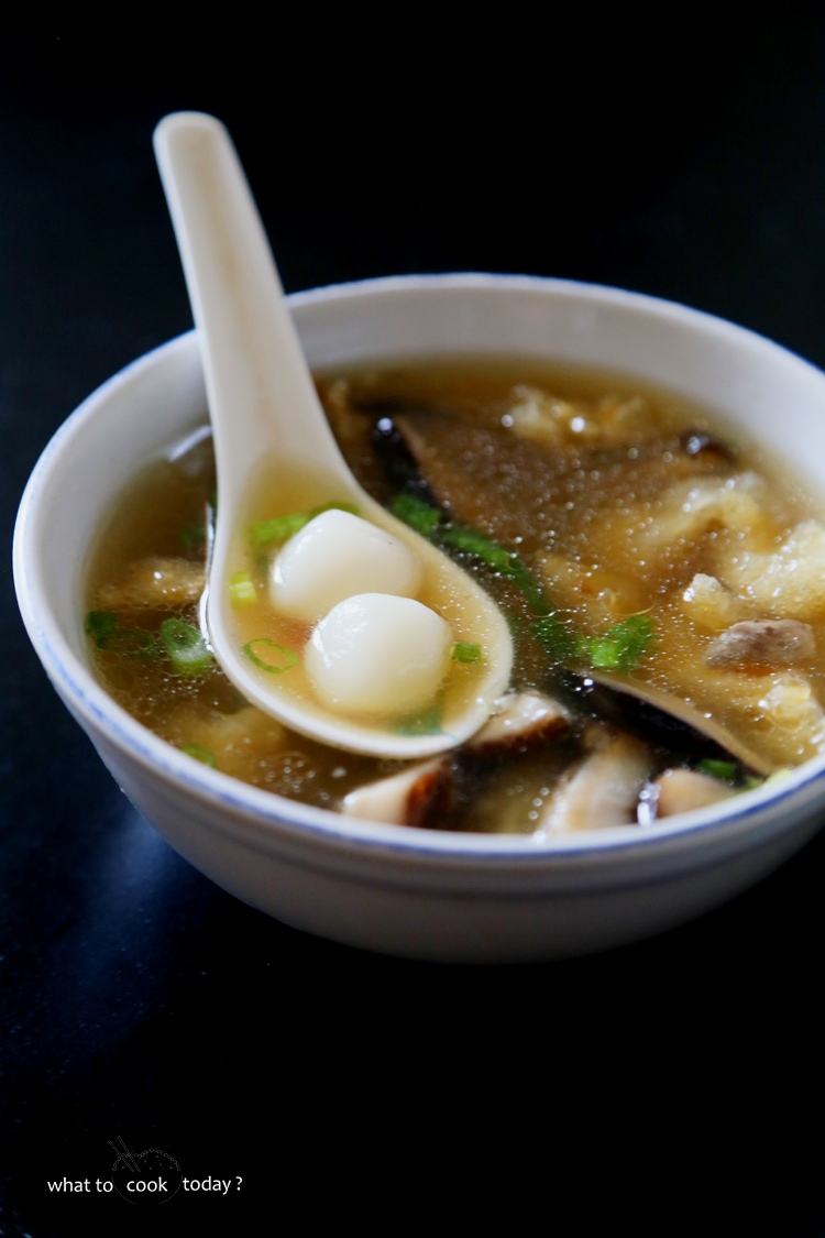 Savory glutinous rice balls in fish maw soup (tang yuan)