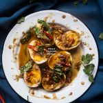 How to make Khai Look Khoey (Thai Eggs with Tamarind Sauce). Delicious and super easy Thai Son-in-law eggs recipe. Click through for full recipe and step by step instructions