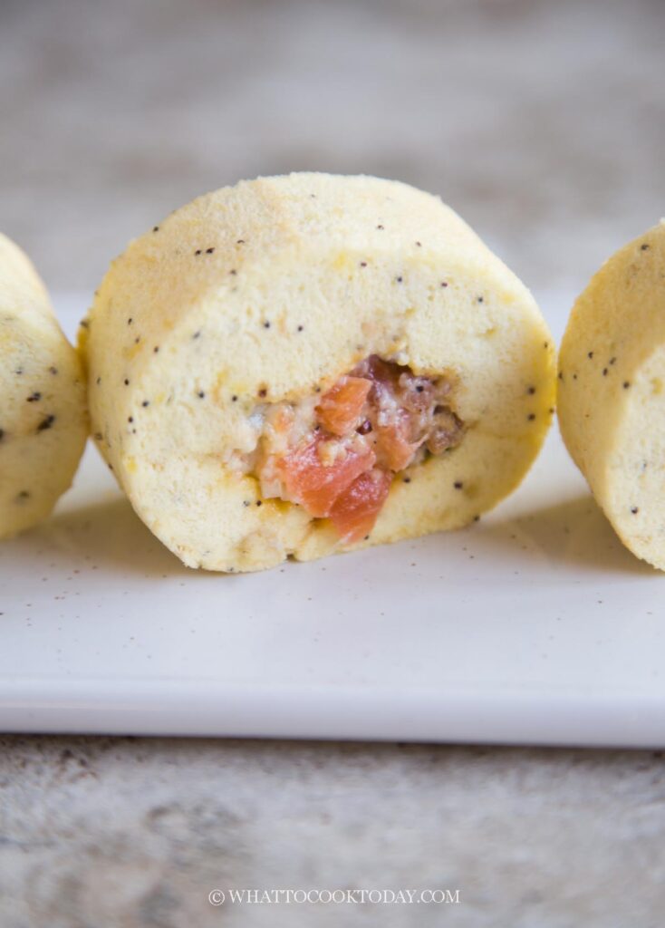 Use the same parchment paper to roll the cake back up tightly. Make sure the seam is at the bottom. Twist the two ends of parchment paper again and keep it chilled in the fridge if not serving right away